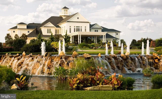 a view of a swimming pool in a backyard