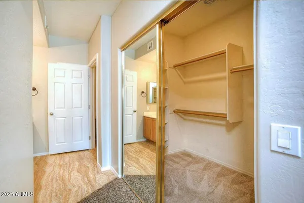 a bathroom with a tub and shower