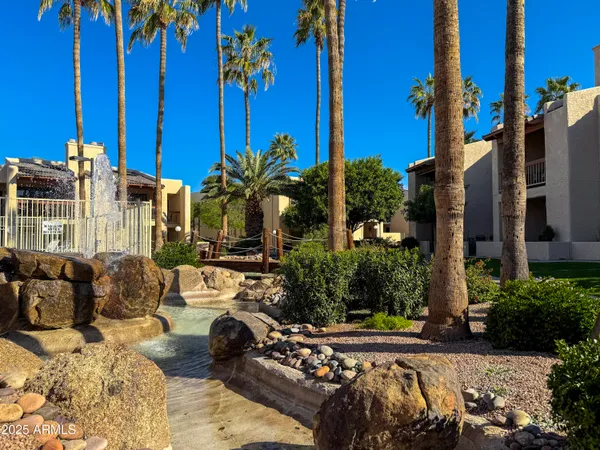 a view of a building with sitting area