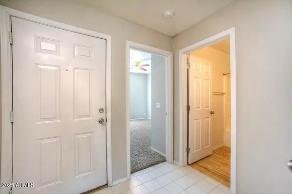 a view of a bathroom with front door