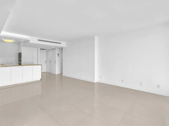 a view of a kitchen with a sink