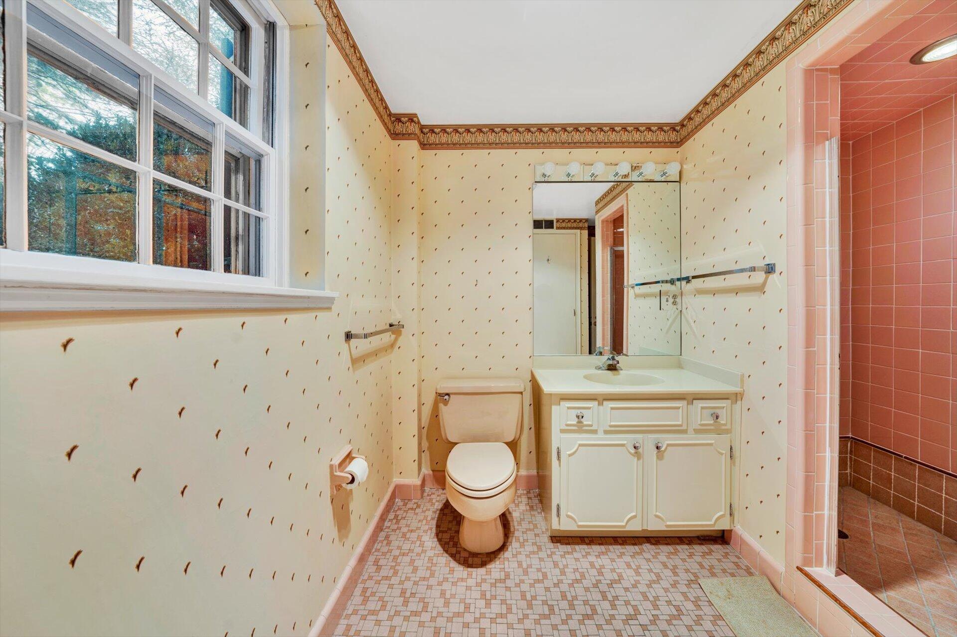 3442 West Ridge Road Southwest Roanoke, VA 24014 - Photo 30 of 42 a bathroom with a granite countertop toilet a sink and a mirror
