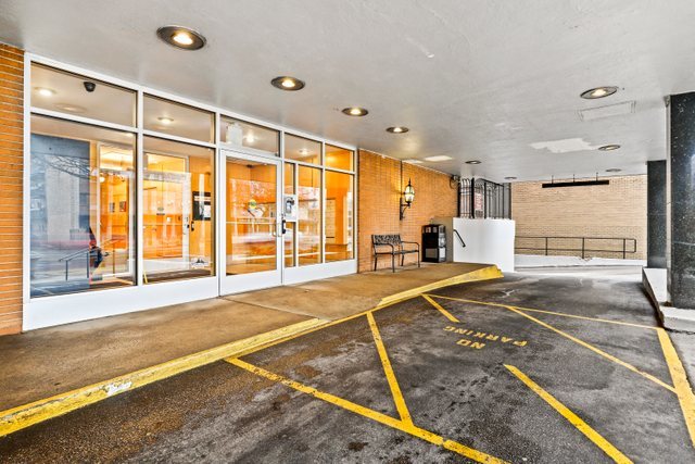 6118 North Sheridan Road, Unit 206 Chicago, IL 60660 - Photo 16 of 18 a room with a bed and a large window