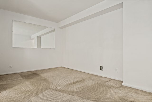 6118 North Sheridan Road, Unit 206 Chicago, IL 60660 - Photo 8 of 18 a view of an empty room
