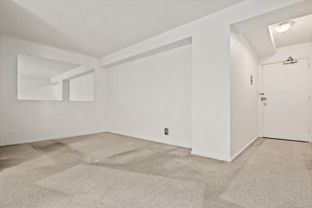 6118 North Sheridan Road, Unit 206 Chicago, IL 60660 - Photo 9 of 18 a view of an empty room