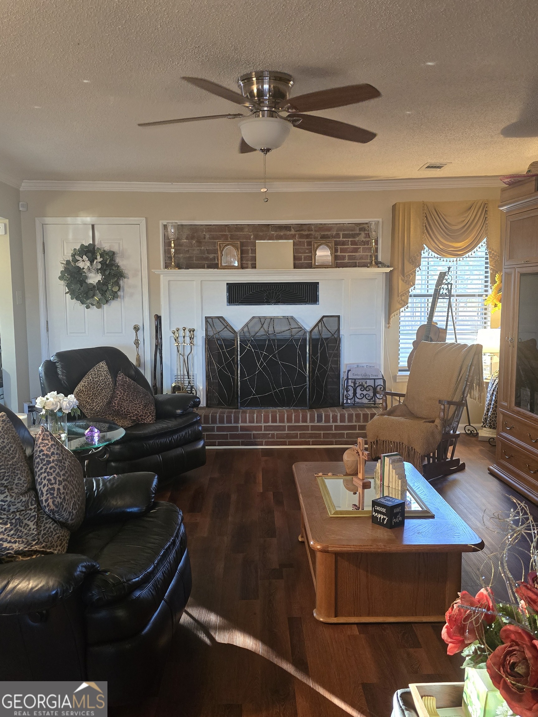 479 Mitchell Loop Bluffton, GA 39824 - Photo 37 of 51 a living room with furniture and a fireplace
