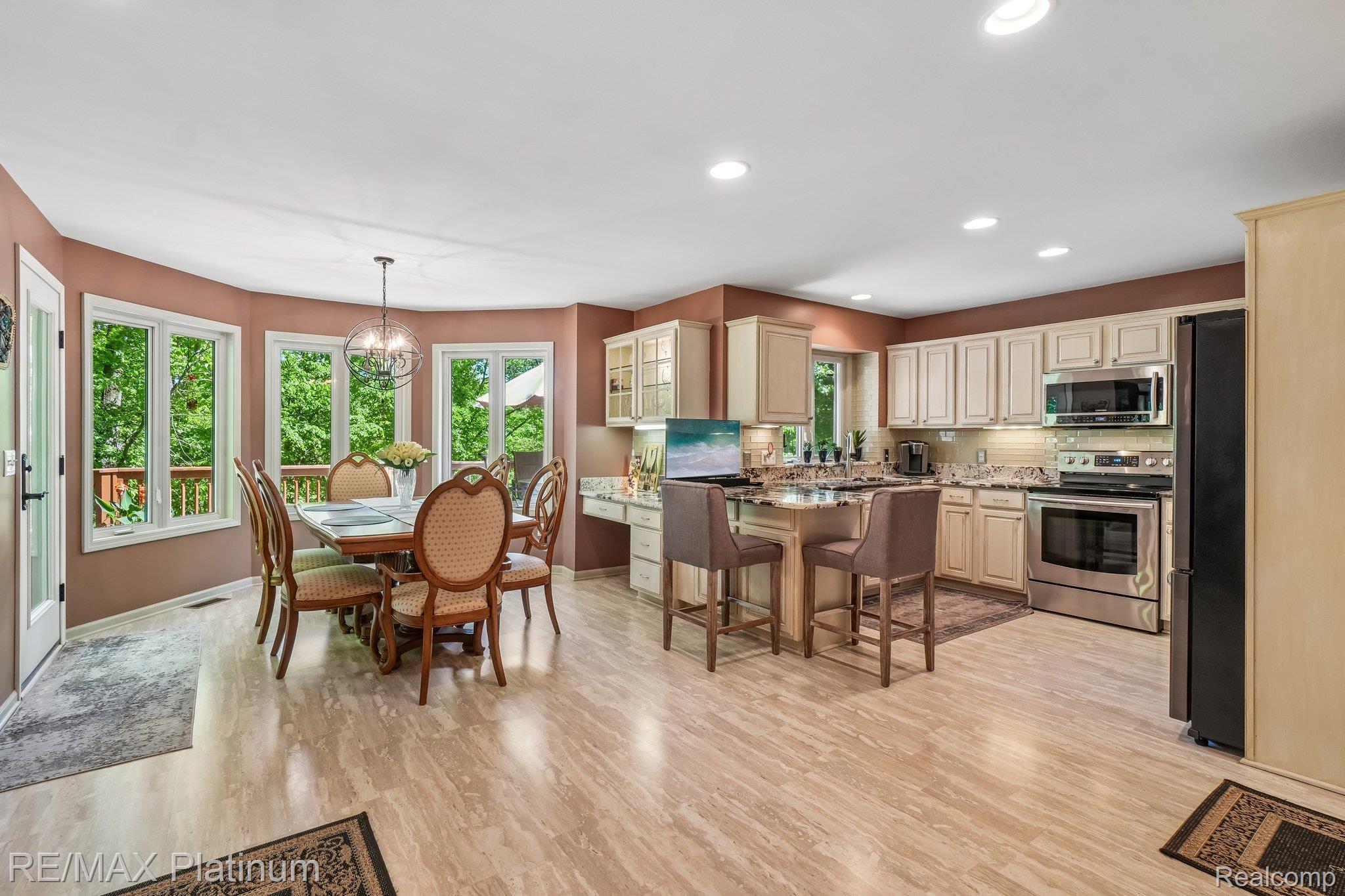 2260 Moorland's View Howell, MI 48855 - Photo 12 of 40 Kitchen with granite counters and stainless appliances