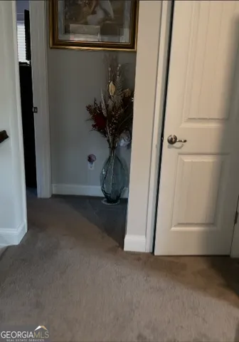 a view of a house with a backyard space