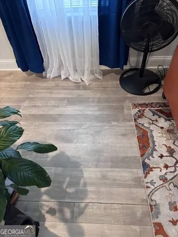 a kitchen with stainless steel appliances granite countertop a refrigerator and a stove