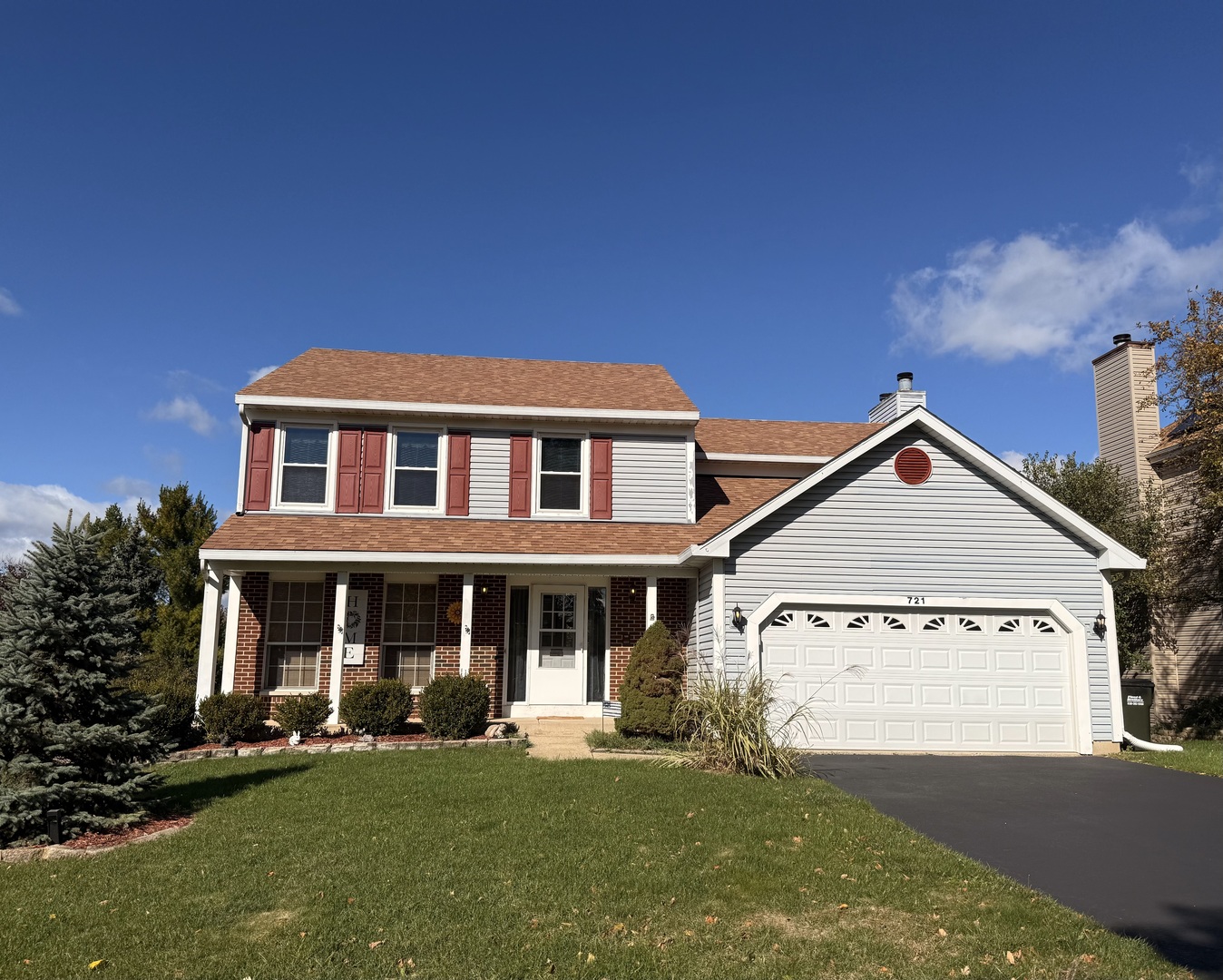 721 Mohican Trail Lake In The Hills, IL 60156 - Photo 1 of 20 a front view of a house with a yard