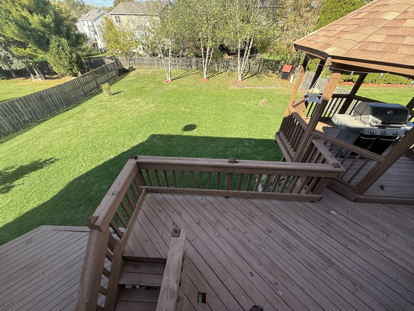 721 Mohican Trail Lake In The Hills, IL 60156 - Photo 19 of 20 a view of a swimming pool with a garden and deck