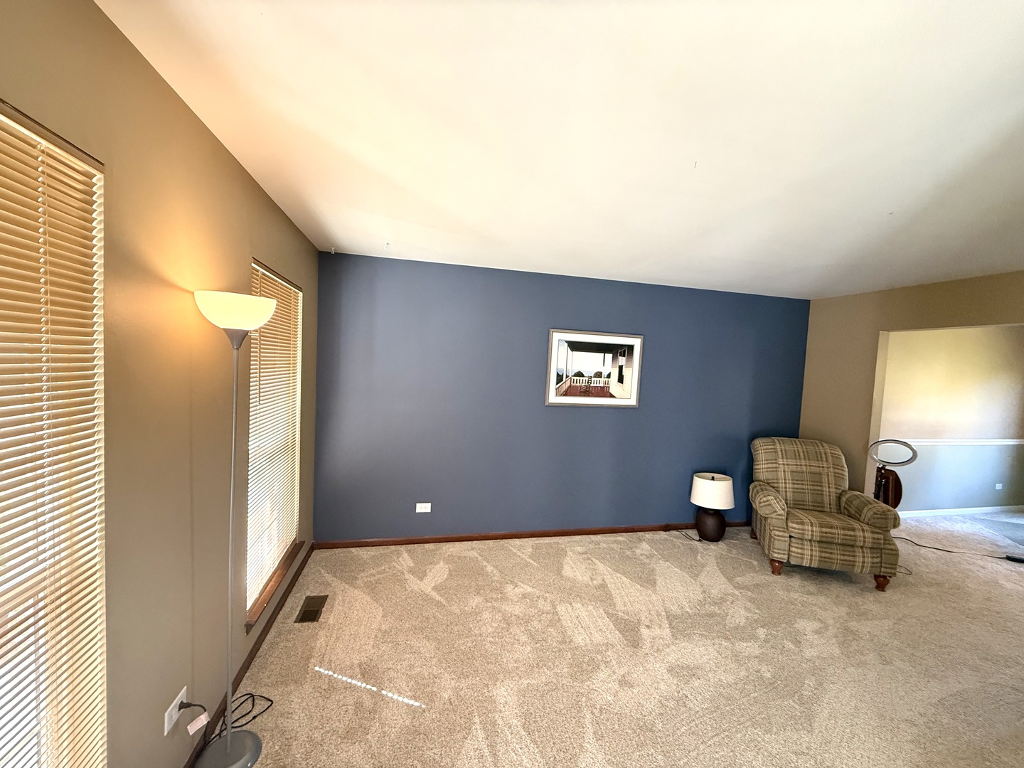 721 Mohican Trail Lake In The Hills, IL 60156 - Photo 7 of 20 a view of a livingroom with furniture and a window
