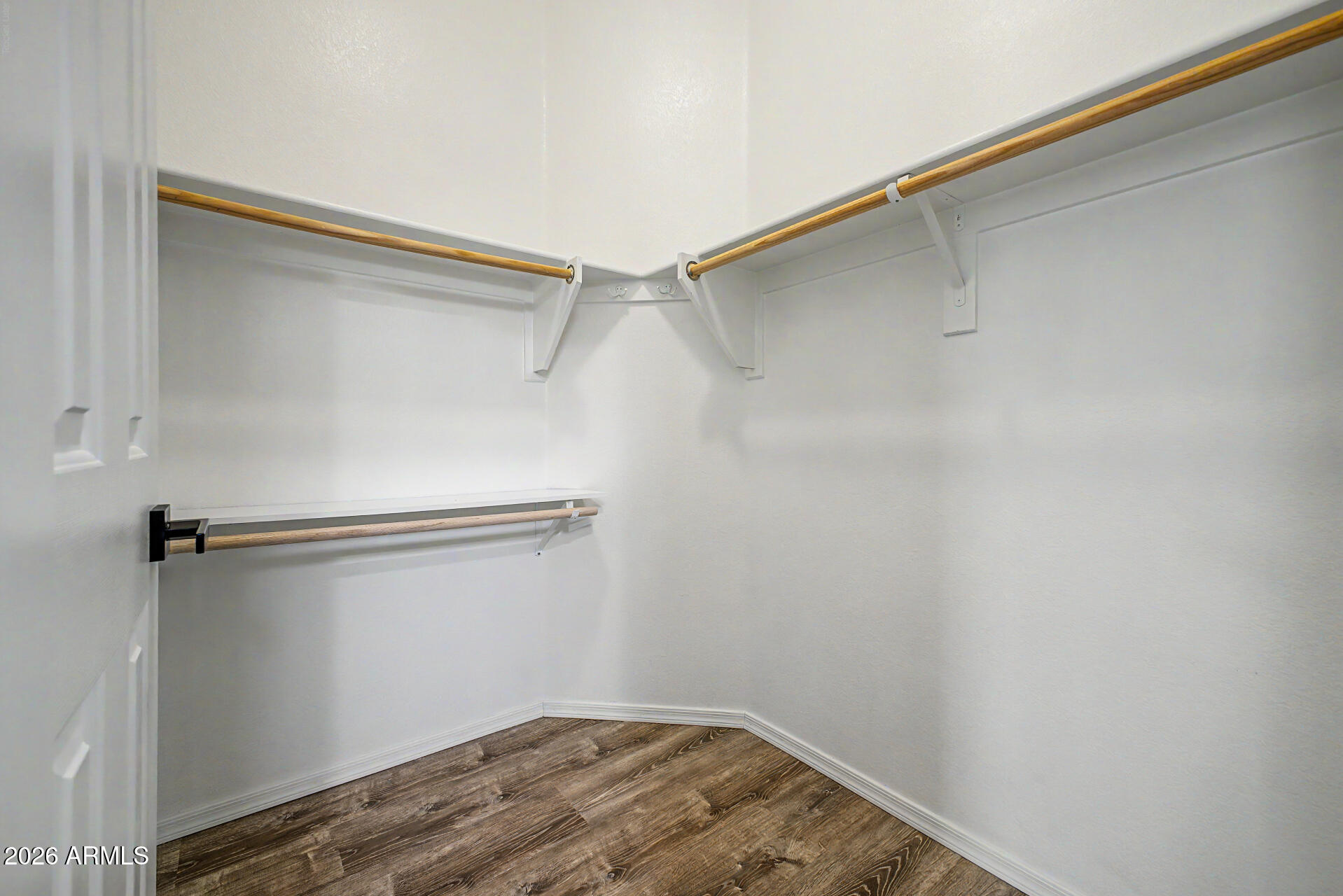 2725 East Mine Creek Road, Unit 2172 Phoenix, AZ 85024 - Photo 20 of 28 a view of a room with racks on the wall