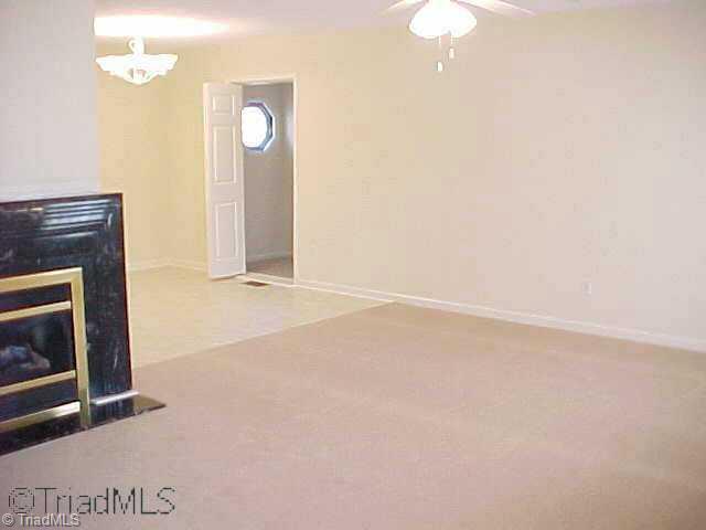 713 Providence Church Road Randleman, NC 27317 - Photo 3 of 7 Other. Open living room with gas log fireplace.