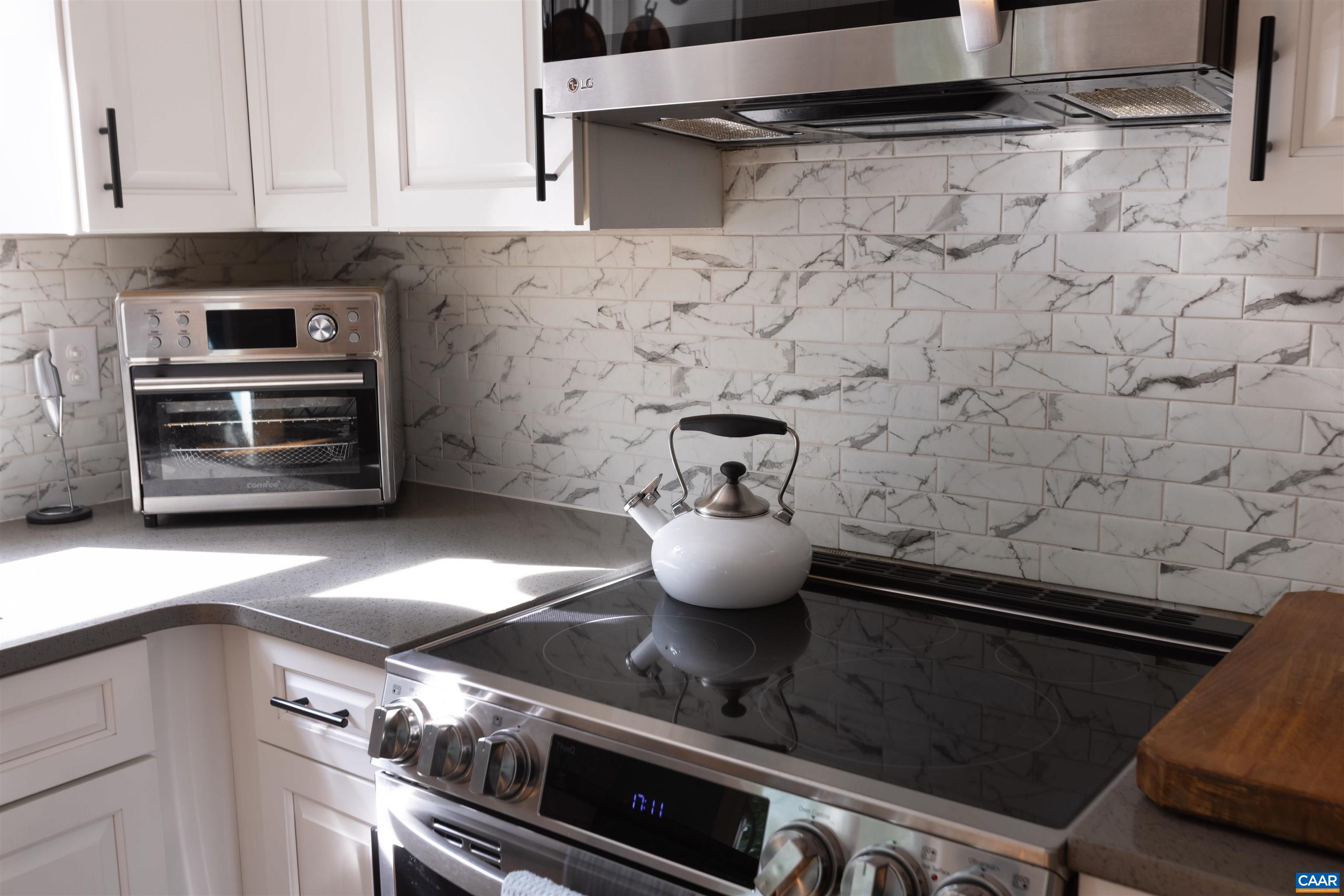 2550 Proffit Road Charlottesville, VA 22911 - Photo 5 of 41 a stove top oven sitting inside of a kitchen