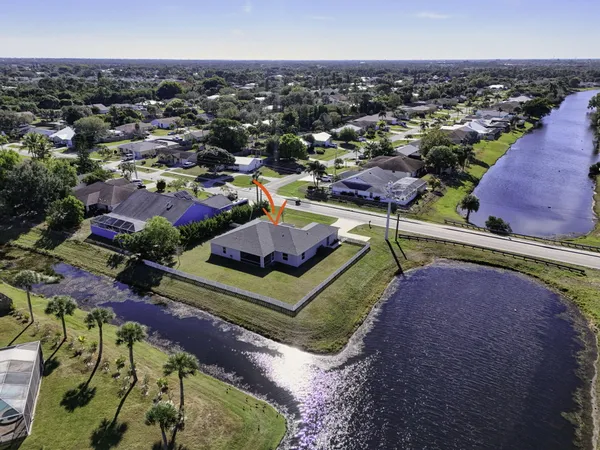an aerial view of a house with a garden