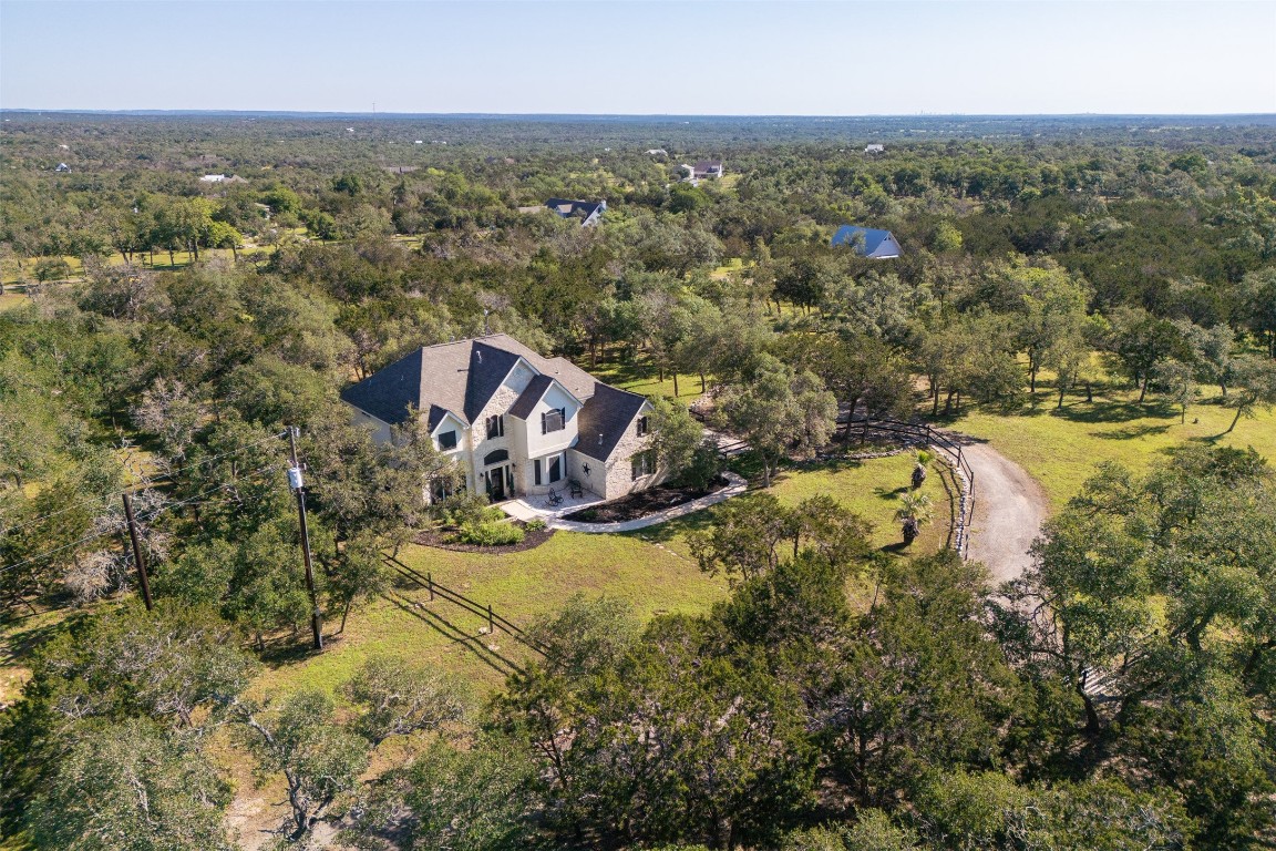 an aerial view of residential house with outdoor space
