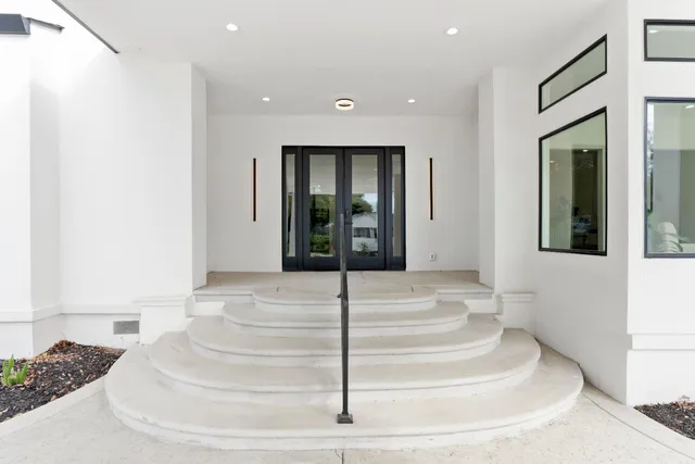 an aerial view of residential house with outdoor space