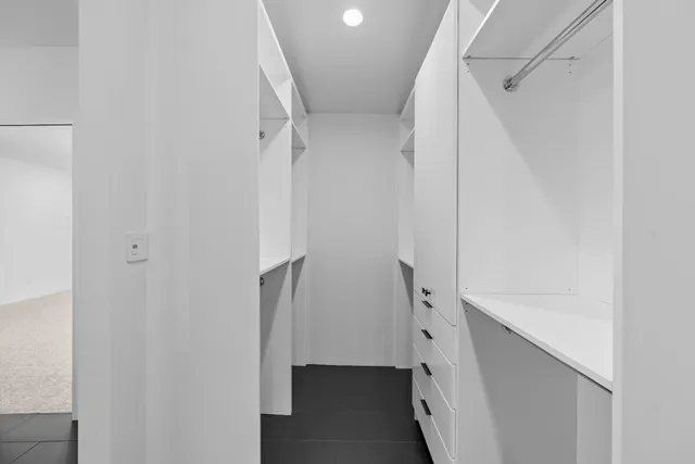 a view of a room with racks on the wall