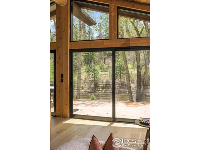 a view of a room with a large window