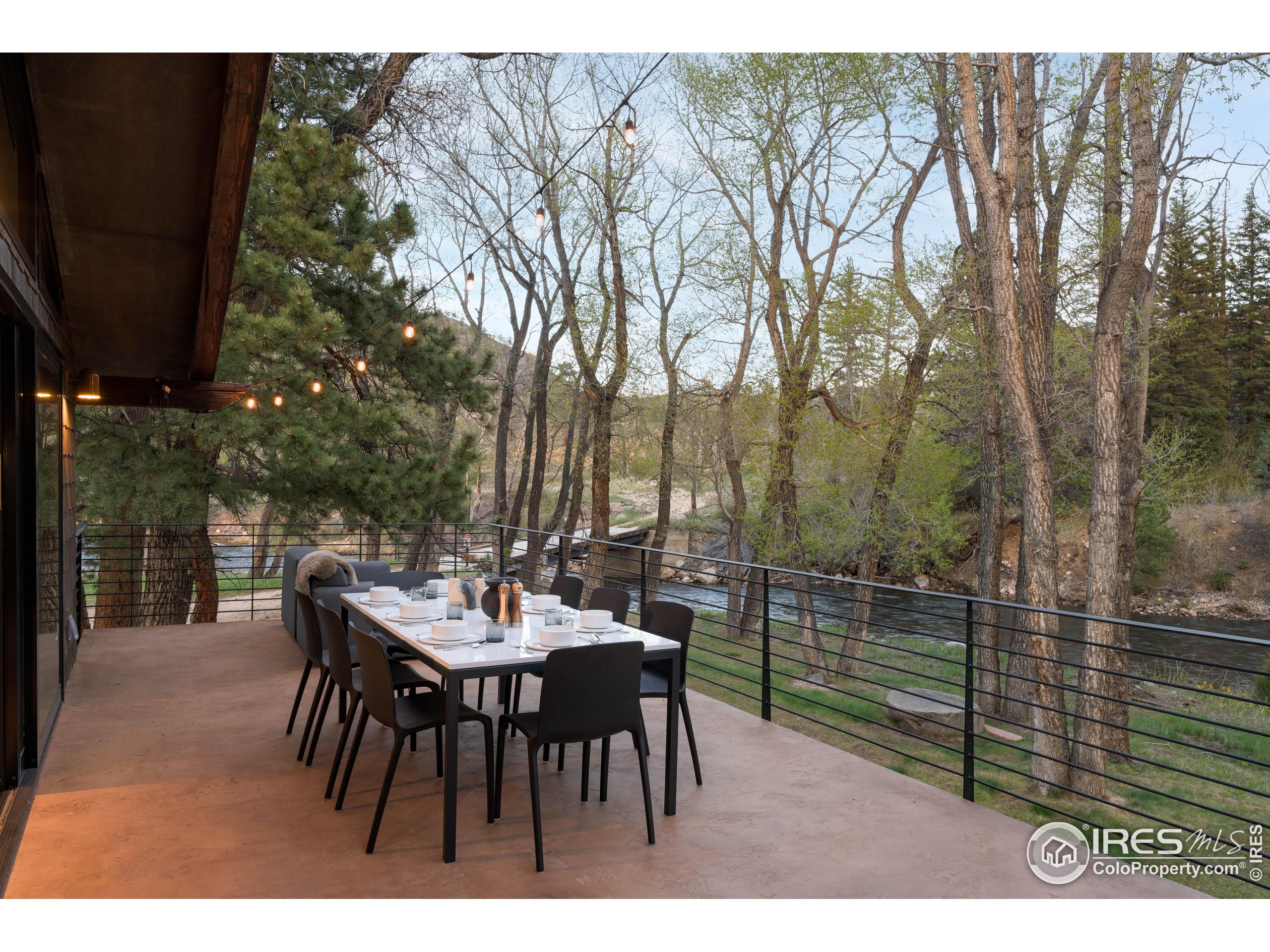 37797 W Highway Bellvue, CO 80512 - Photo 20 of 40 a view of a table and chairs in the patio