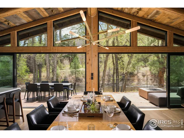 a living room with large windows