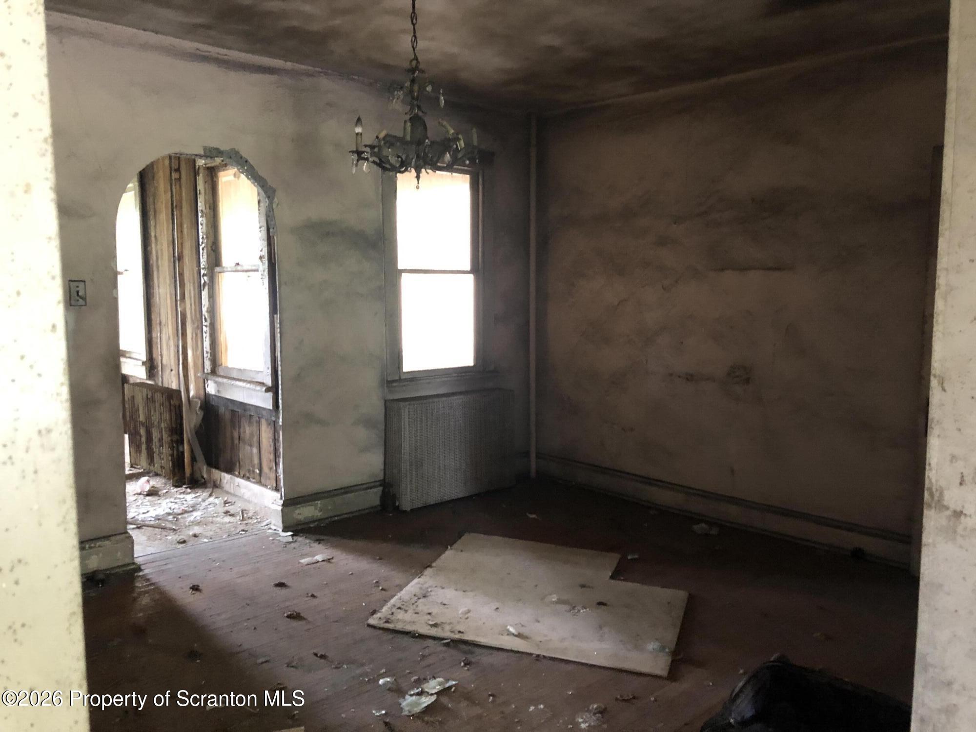 920 Eynon Street Scranton, PA 18504 - Photo 6 of 14 a view of empty room with windows