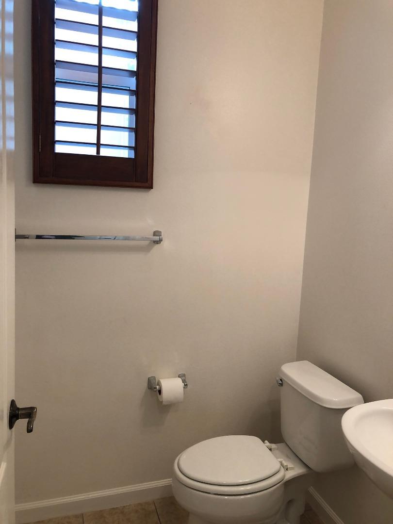 1001 Cedarwood Loop San Ramon, CA 94582 - Photo 36 of 40 a white toilet sitting next to a window