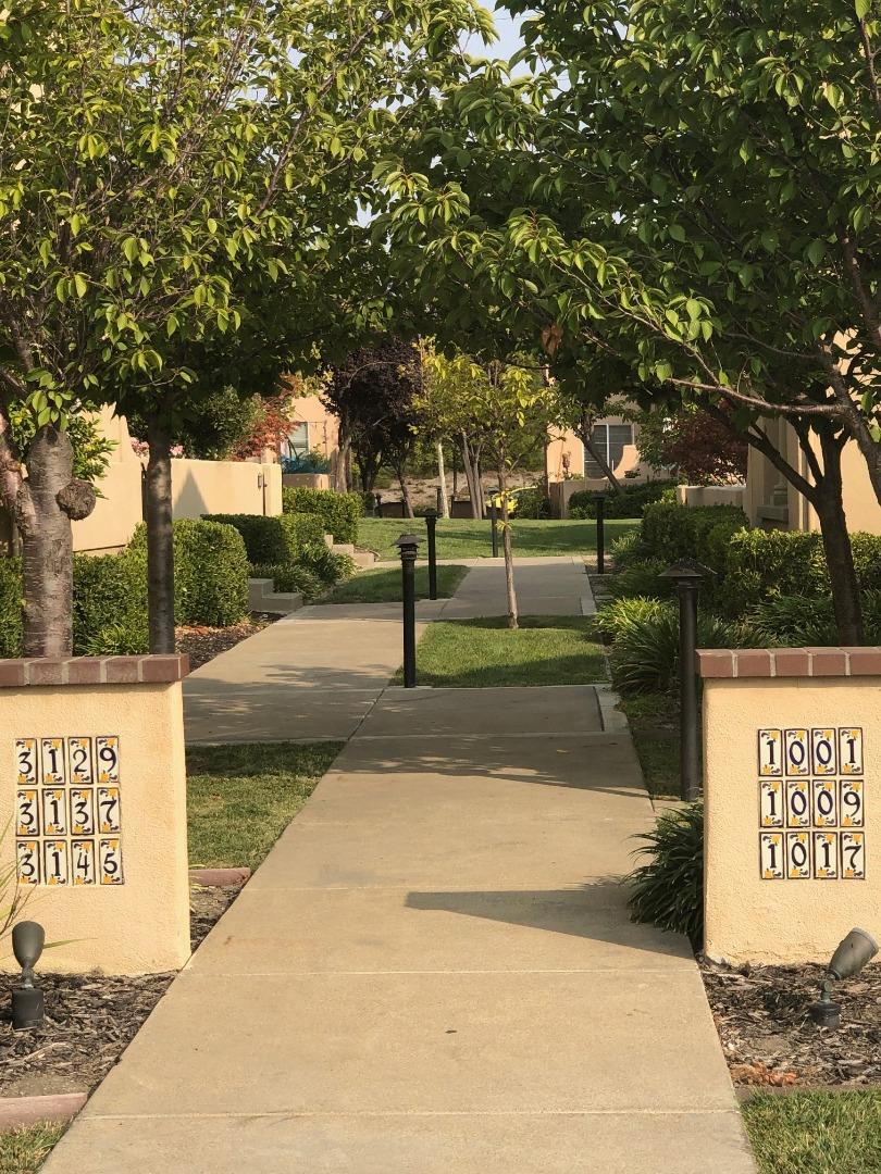 1001 Cedarwood Loop San Ramon, CA 94582 - Photo 6 of 40 a sign board with yard in the back