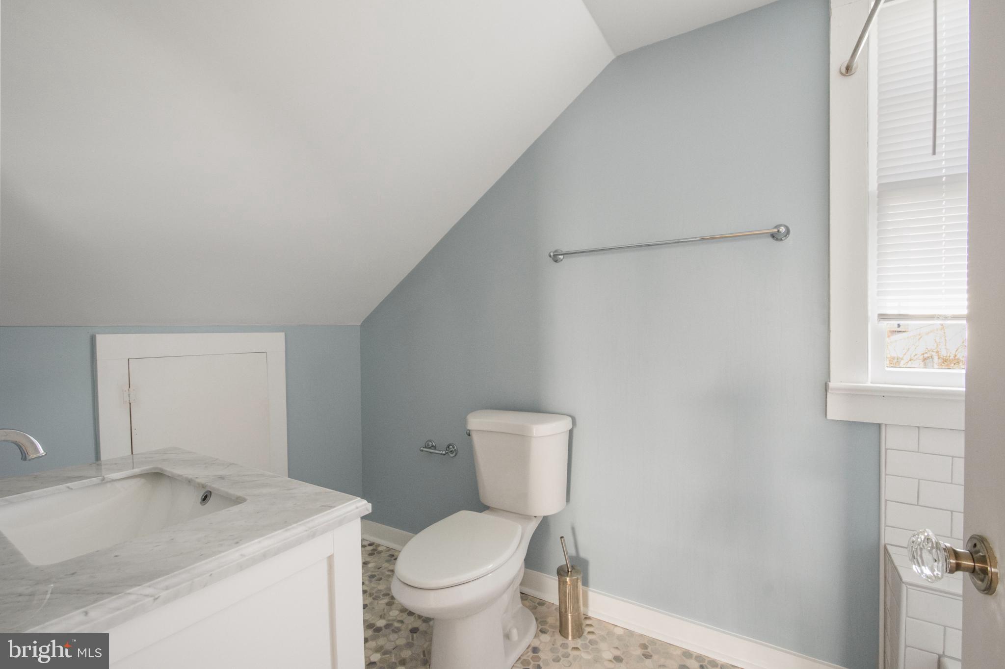 455 Deale Road Deale, MD 20751 - Photo 19 of 20 a bathroom with a sink toilet and vanity