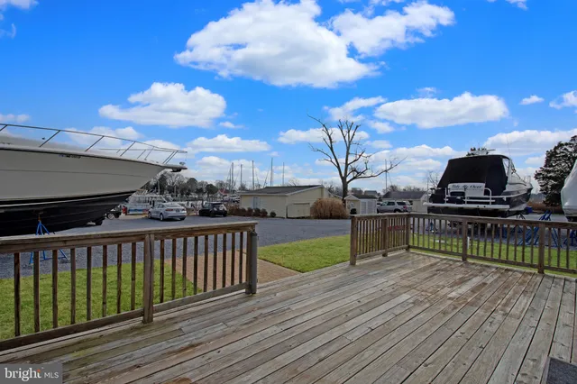 a view of a balcony with wooden floor