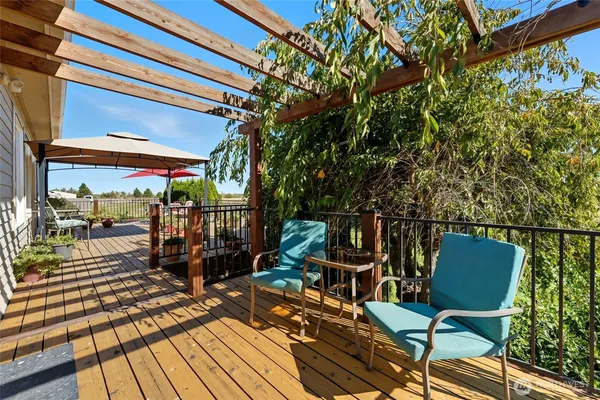 a balcony view with a seating space