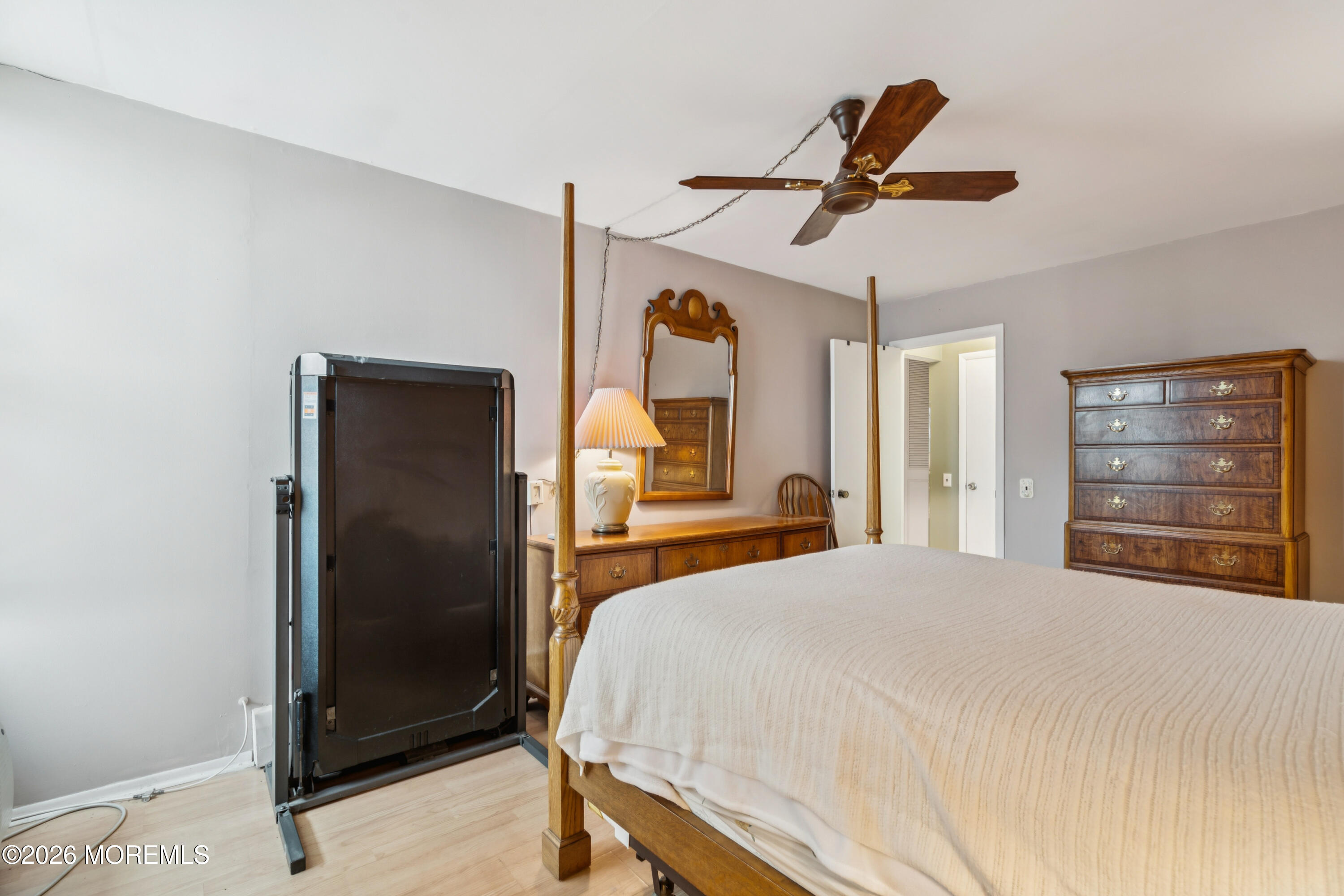 11 River Road, Unit 11L Nutley, NJ 07110 - Photo 17 of 26 a bedroom with a bed and a window