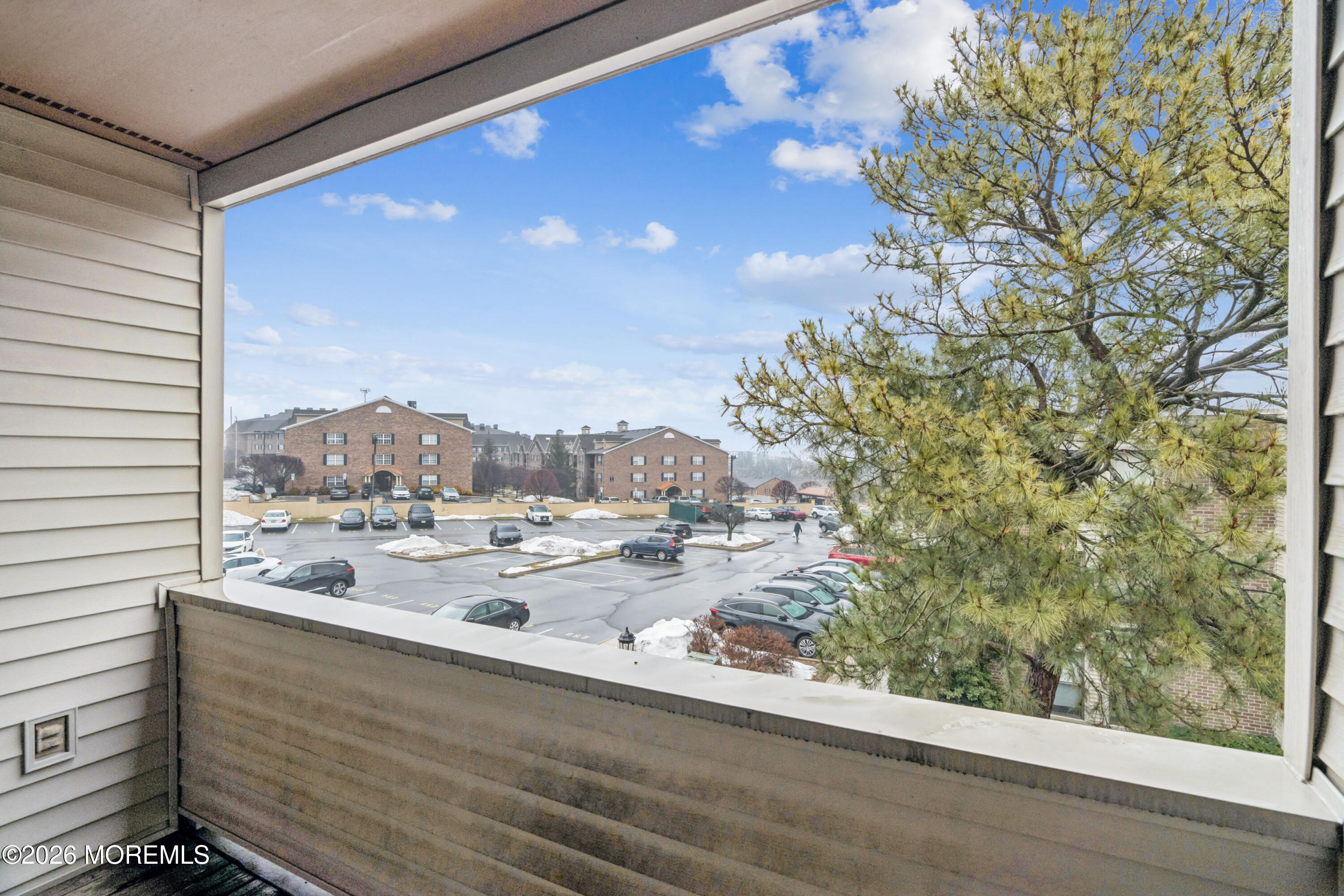 11 River Road, Unit 11L Nutley, NJ 07110 - Photo 20 of 26 a view of a balcony with a yard