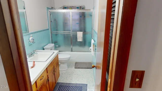 a bathroom with a sink and toilet