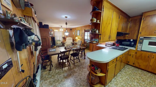 a view of a dining room with furniture