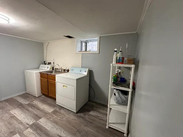 a view of a room with washer and dryer