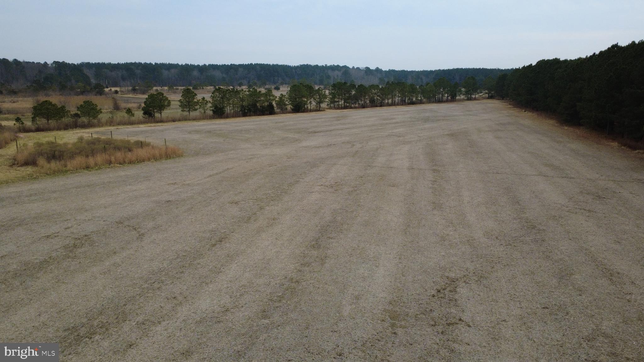 1829 Brannock Neck Road Cambridge, MD 21613 - Photo 24 of 55 a view of a field with an ocean