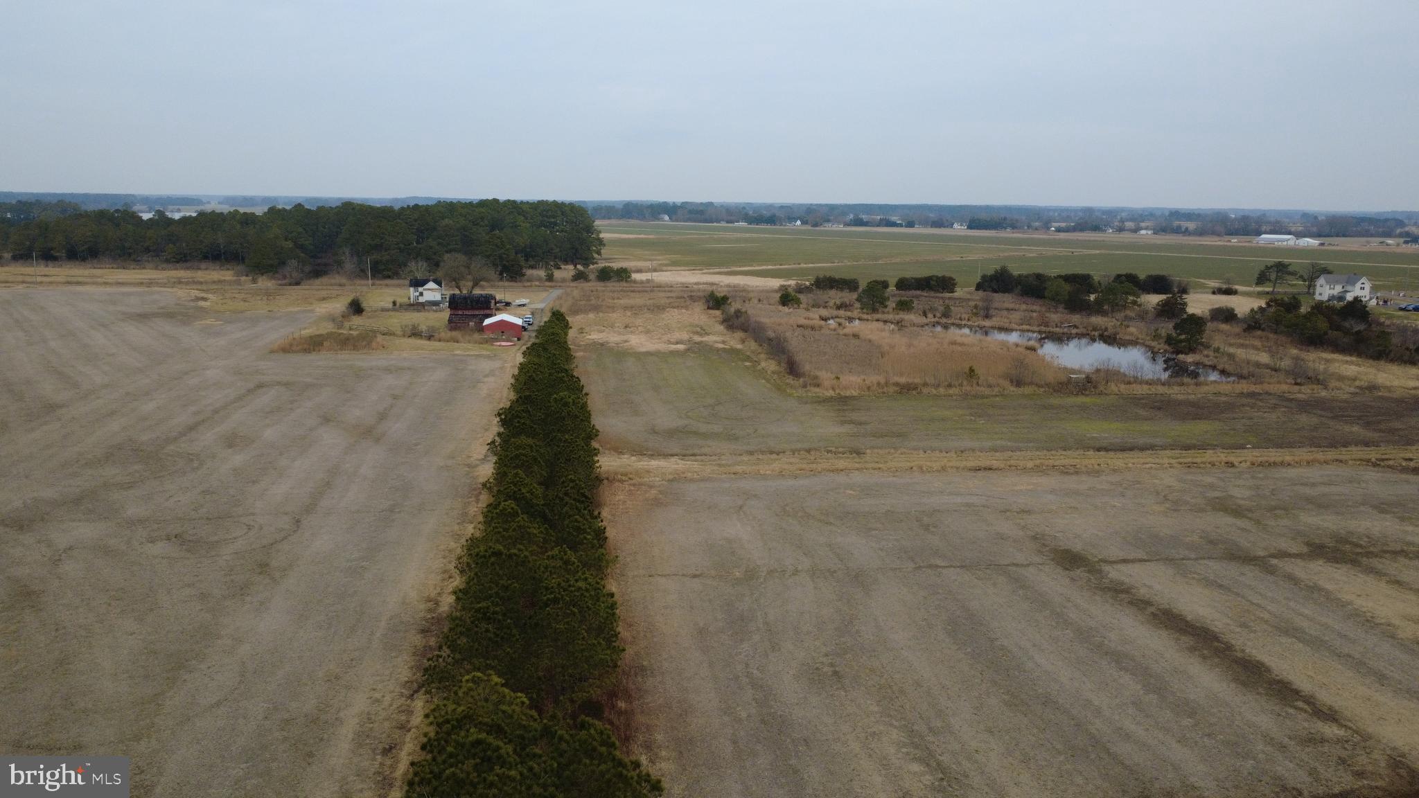 1829 Brannock Neck Road Cambridge, MD 21613 - Photo 26 of 55 a view of a lake with a mountain