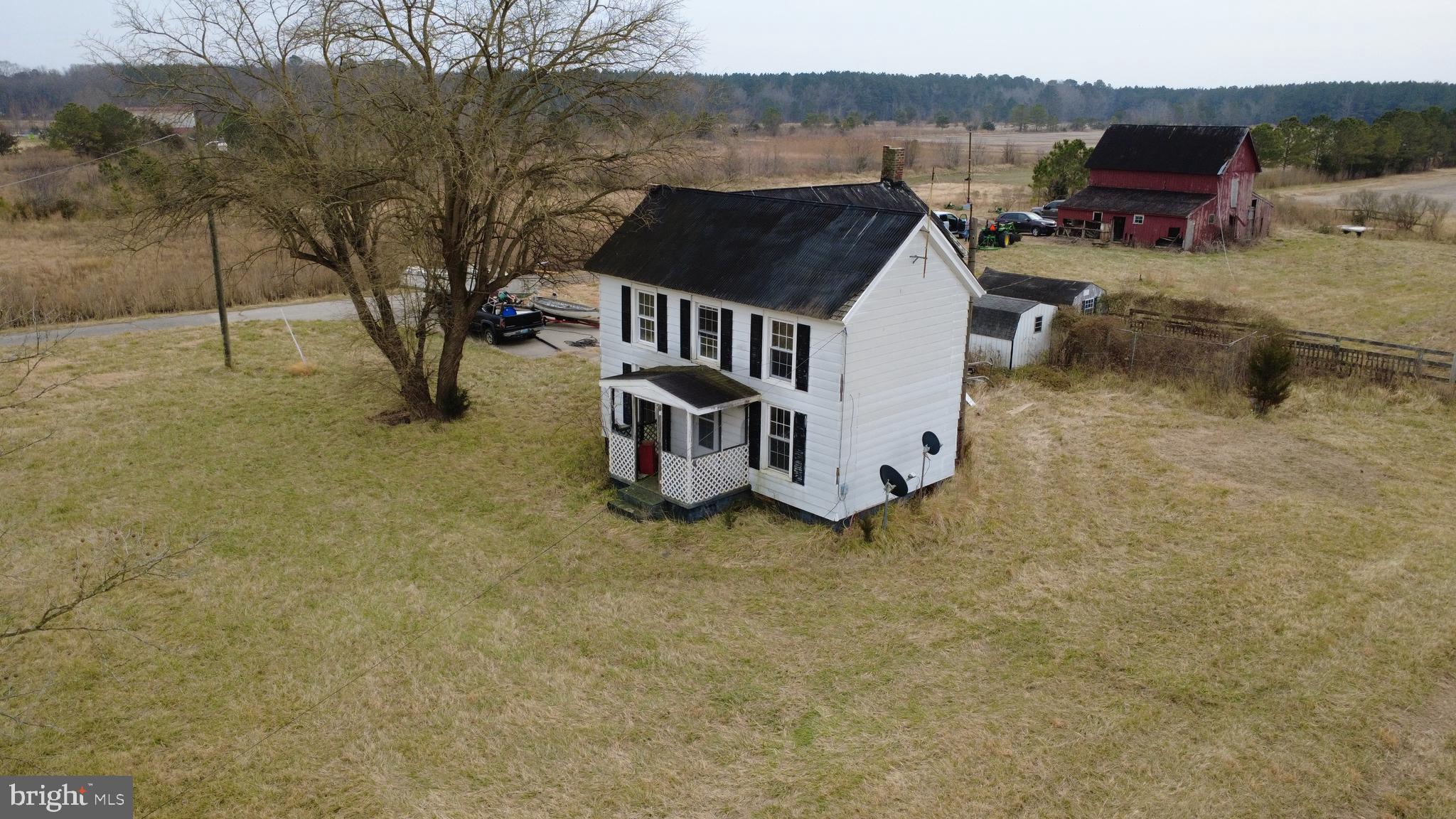 1829 Brannock Neck Road Cambridge, MD 21613 - Photo 54 of 55 a view of a house with backyard and sitting area