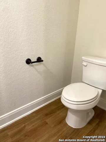 a bathroom with a toilet and a sink