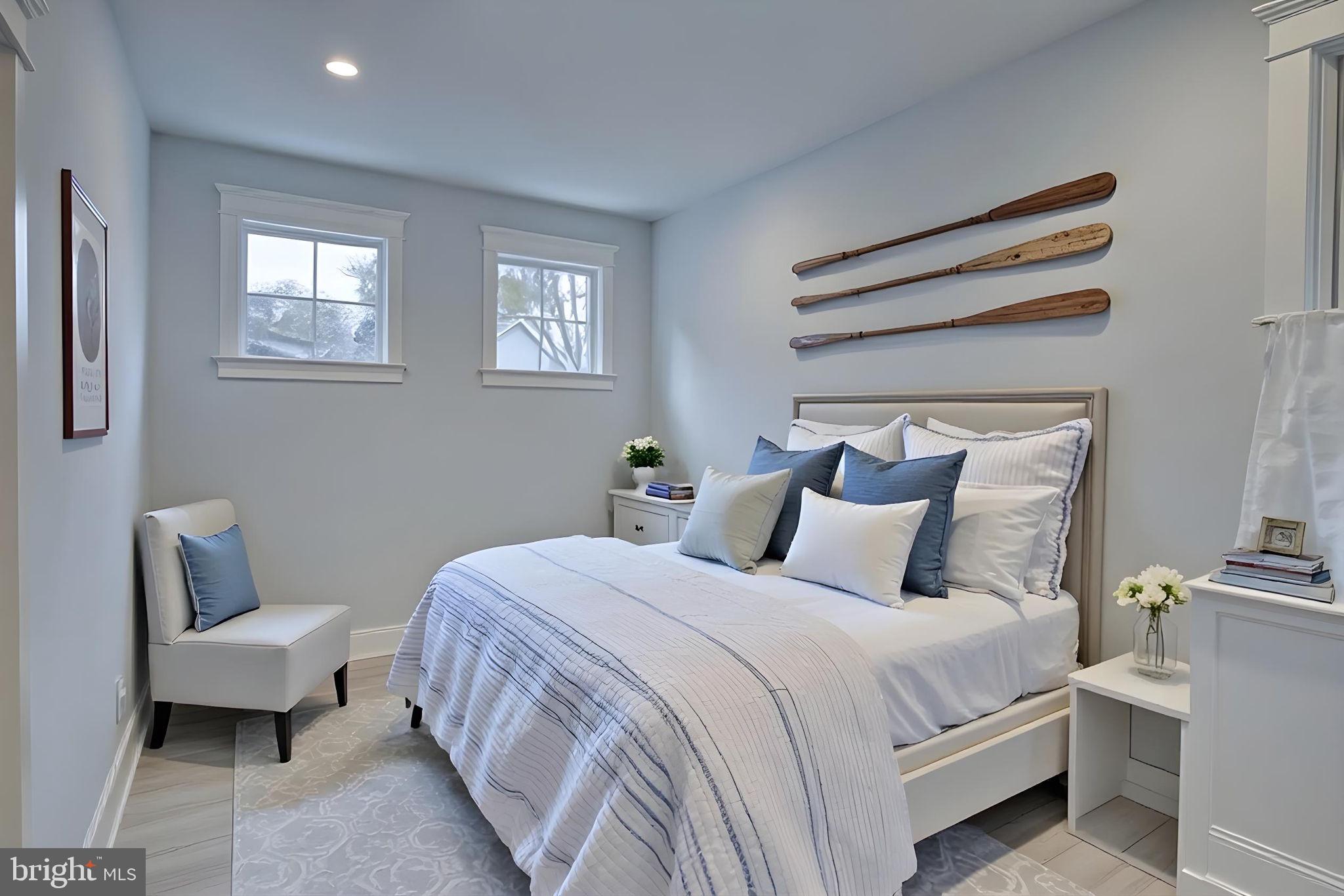 237 2nd Street Lewes, DE 19958 - Photo 10 of 52 a bedroom with bed and a couch