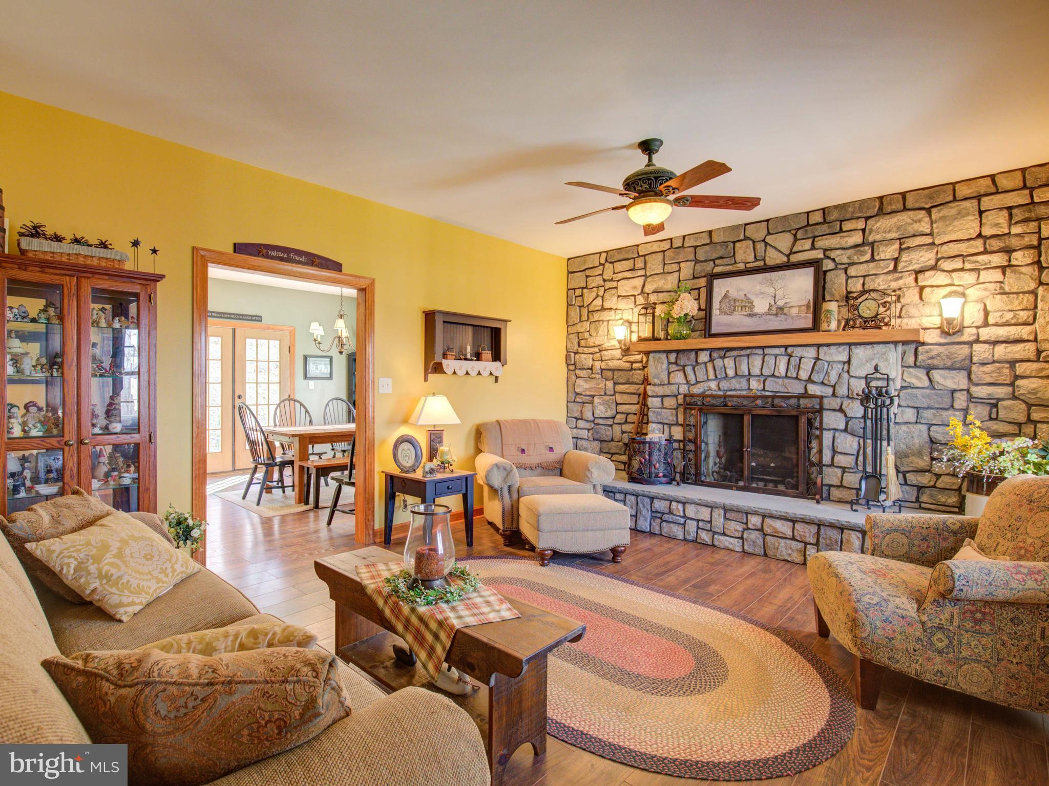 1174 Perry Road Winchester, VA 22602 - Photo 5 of 25 Cozy family room with stone fireplace!