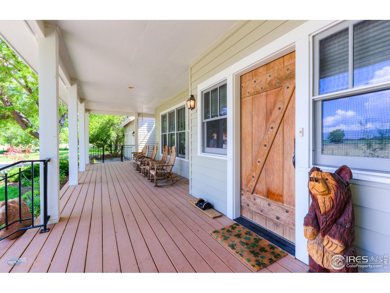 8524 Valmont Road Boulder, CO 80301 - Photo 5 of 40 a view of outdoor space with porch wooden floor and front door