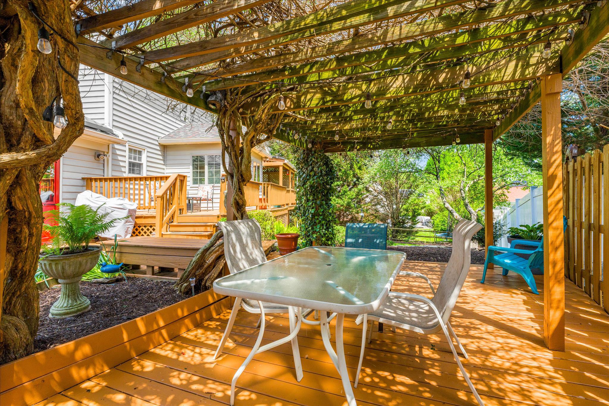 12400 Triple Crown Road Gaithersburg, MD 20878 - Photo 40 of 45 Patio Sitting Area Beneath the Pergola