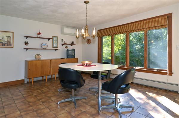 56 Baldpate Road Georgetown, MA 01833 - Photo 12 of 30 a view of a dining room with furniture window and outside view