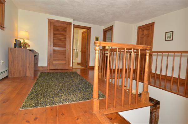 56 Baldpate Road Georgetown, MA 01833 - Photo 13 of 30 a view of a porch with wooden floor