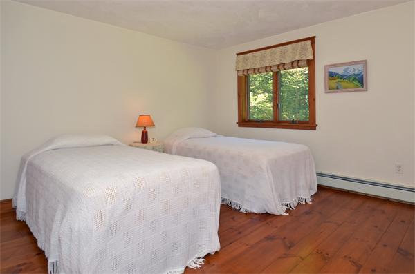 56 Baldpate Road Georgetown, MA 01833 - Photo 19 of 30 a bedroom with a bed and a window