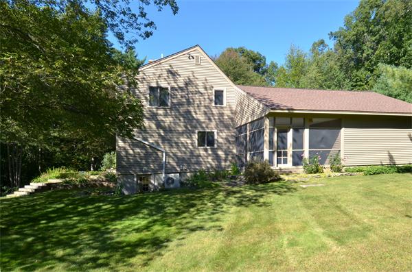 56 Baldpate Road Georgetown, MA 01833 - Photo 29 of 30 a view of house with yard and green space