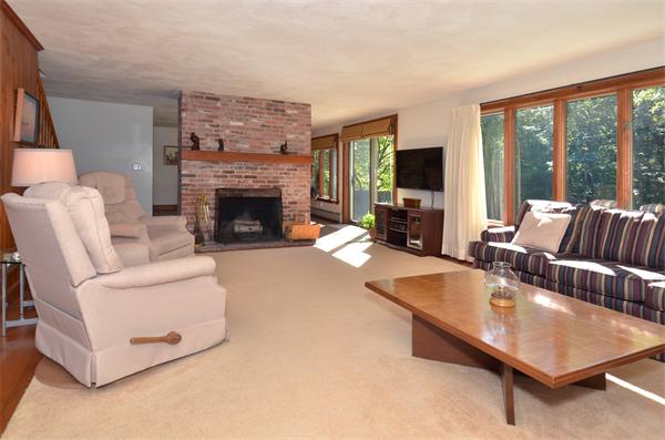 56 Baldpate Road Georgetown, MA 01833 - Photo 4 of 30 a living room with furniture large window and a fireplace